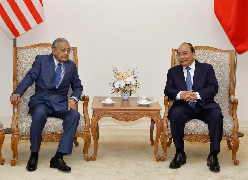 越南政府总理阮春福与马来西亚总理马哈蒂尔·穆罕默德举行会谈。图自越通社