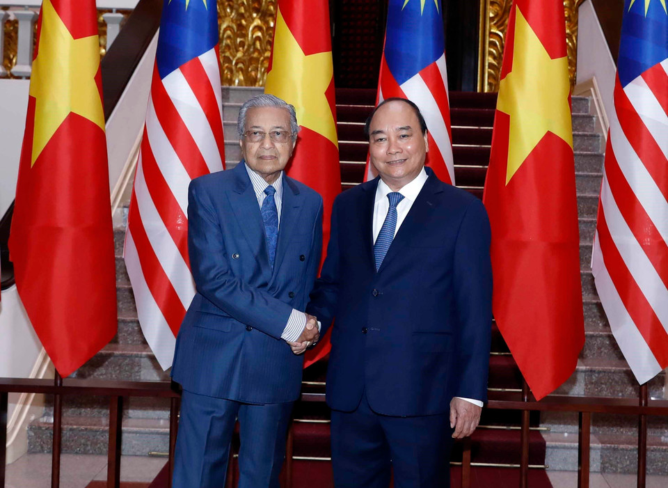越南政府总理阮春福与马来西亚总理马哈蒂尔·穆罕默德。图自越通社