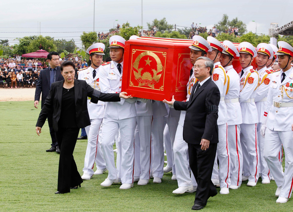 安葬仪式在宁平省金山县光善乡13号村举行。图自越通社