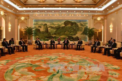 中共中央总书记、中国国家主席习近平在人民大会堂亲切会见了越共中央委员、中央对外部部长、越共中央总书记阮富仲的特使黄平君。