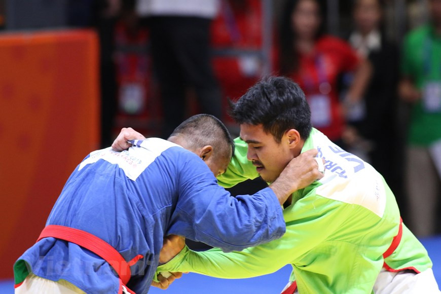 裴明君在男子81公斤一下级决赛中战胜印度尼西亚武士。图自Vietnamplus