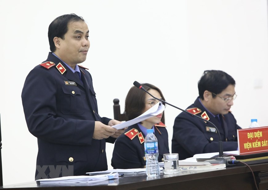 审判员宣读被告人的告状。图自越通社