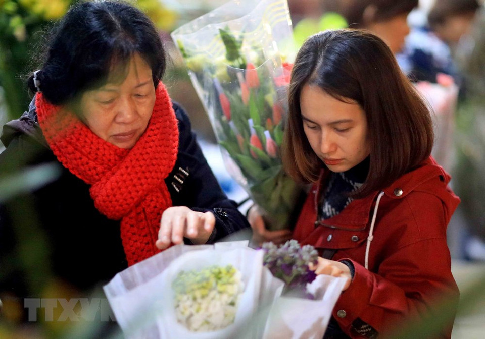 广霸花市原本是日新坊三岔路口的一处自发集市，满足日新、广安及慈廉县一些乡的居民种植和销售鲜花的需求。越通社记者 日英 摄