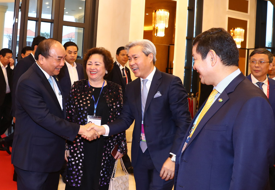 越南政府总理阮春福会见出席2017年APEC领导人会议周的国内外经济集团代表。越通社记者统一 摄