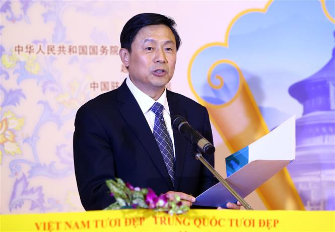 中共中央宣传部部务会成员、中国国务院新闻办副主任郭卫民在此展开幕式上发言。（图片来源：越通社）