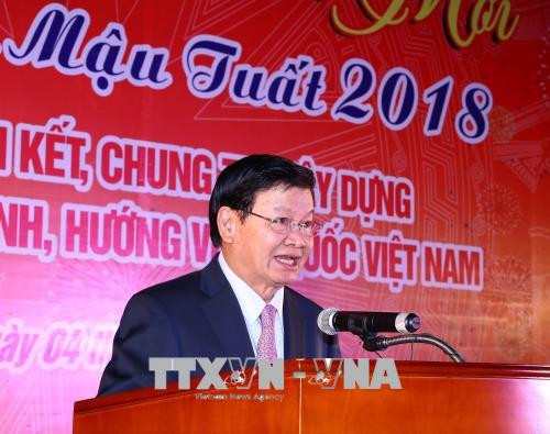 老挝政府总理通伦·西苏里在2018戊戌年迎新春见面会上发表讲话。越通社记者 统一 摄