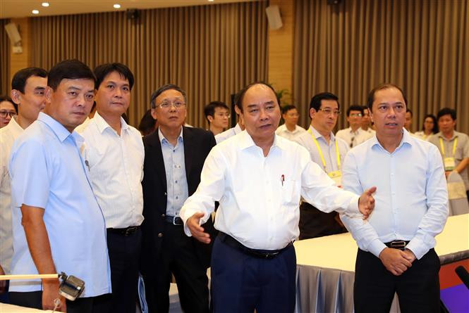 6月25日在河内，越南政府总理阮春福就第36届东盟峰会准备工作进行实地考察。越通社记者 统一 摄