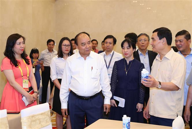 阮春福总理指导外交部和各职能机构为国内外记者进行报道提供最大便利。越通社记者 统一 摄