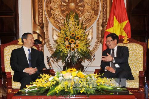  政府副总理兼外长范平明会见中国广西壮族自治区党委书记彭清华。