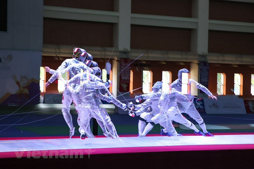 第31届东动会共设置40个大项526个小项，吸引东南亚11个国家的约1万名运动员、教练员、裁判等参加。击剑比赛从5月11日至19日在河内美廷室内田径馆举行。在第31届东运会上，越南击剑队已出色完成所提出的目标，夺得5枚金牌、1枚银牌和6枚铜牌。在决赛中越南击剑运动员武成安与泰国运动员角逐。图自Vietnam+