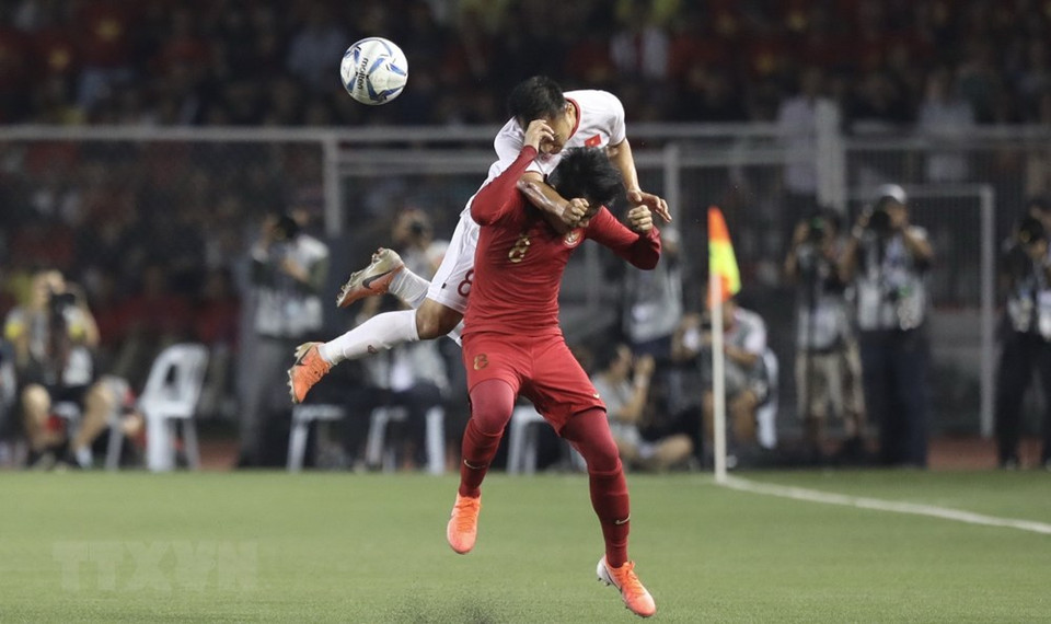 仲皇努力挡球。越通社记者 黄灵 摄