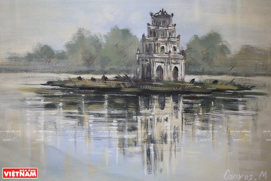 普洛特尼科夫•叶夫格拉夫•叶夫根尼耶维奇和沙吉夫丽塔两名画家的绘画作品。图自越通社/《越南画报》