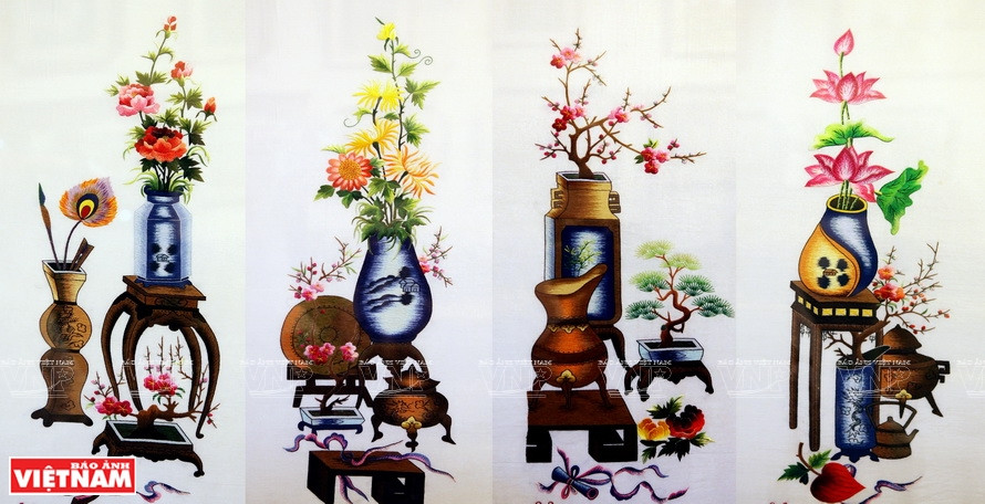 橘洞双面刺绣画以薄纱作面料，以真丝作绣线，无从分辨起点，也无法看出终点，每针每线都非常灵巧，作品栩栩如生。越通社记者 郑部 摄