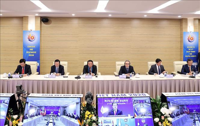 在越南会场出席会议的代表们。图自越通社