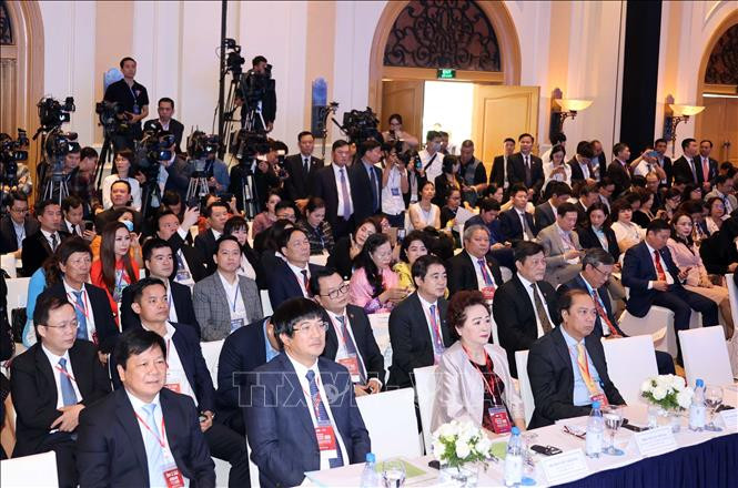 国内外代表出席会议。图自越通社