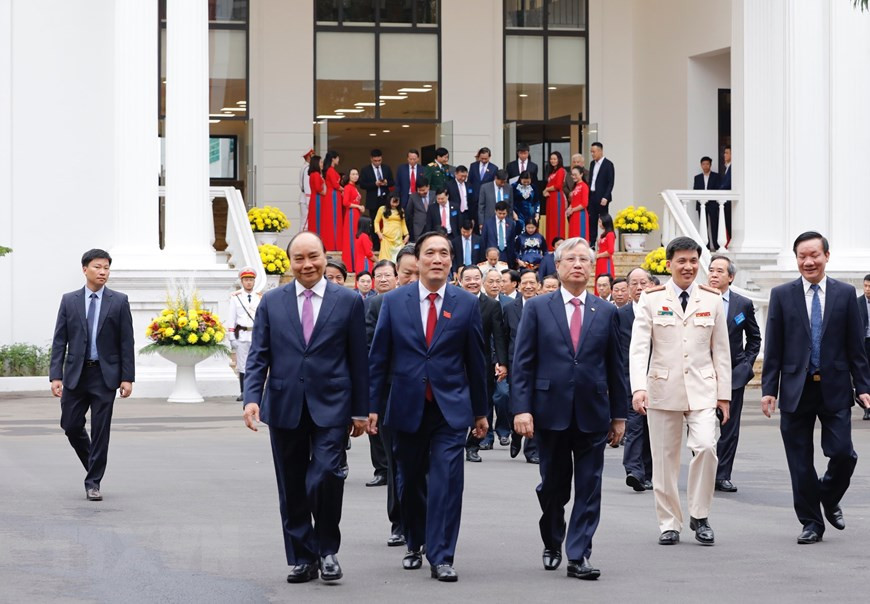 越共中央政治局委员、越南政府总理阮春福和越共中央政治局委员、中央书记处常务书记陈国旺一同出席富寿省党部代表大会。图自越通社