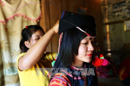 哈尼族姑娘打扮。（图片来源：越通社）