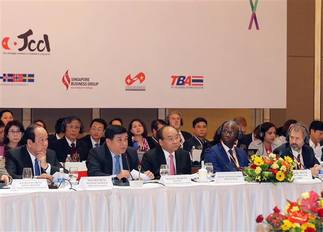 政府总理阮春福出席2017年度越南企业论坛。（图片来源：越通社）