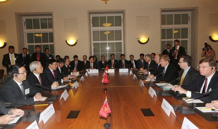 资料图：于2015年7月6日至10日对美国进行正式访问期间，越共中央总书记阮富仲出席与美国企业的座谈会。图自越通社