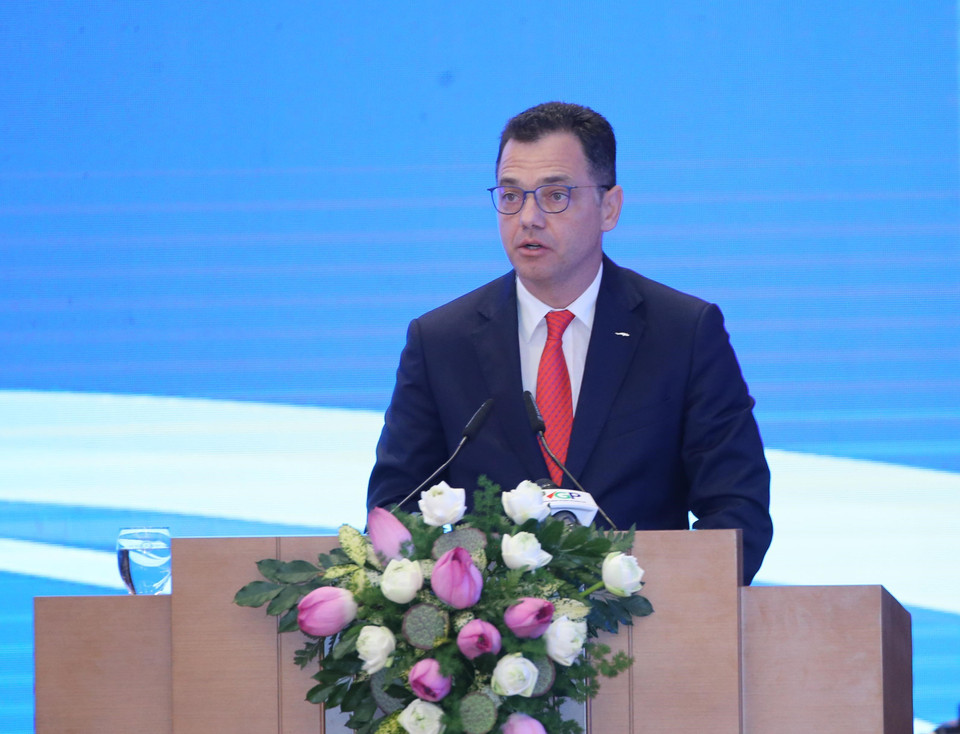 罗马尼亚营商环境贸易和创业部部长斯特凡•拉杜•奥普雷亚发表讲话。图自越通社