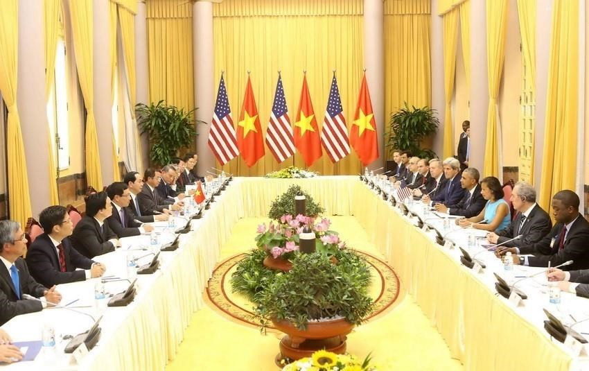 资料图：于2016年5月22日至24日对越南进行国事访问期间，5月23日上午，越南国家主席陈大光与美国总统巴拉克·奥巴马在主席府举行会谈。图自越通社