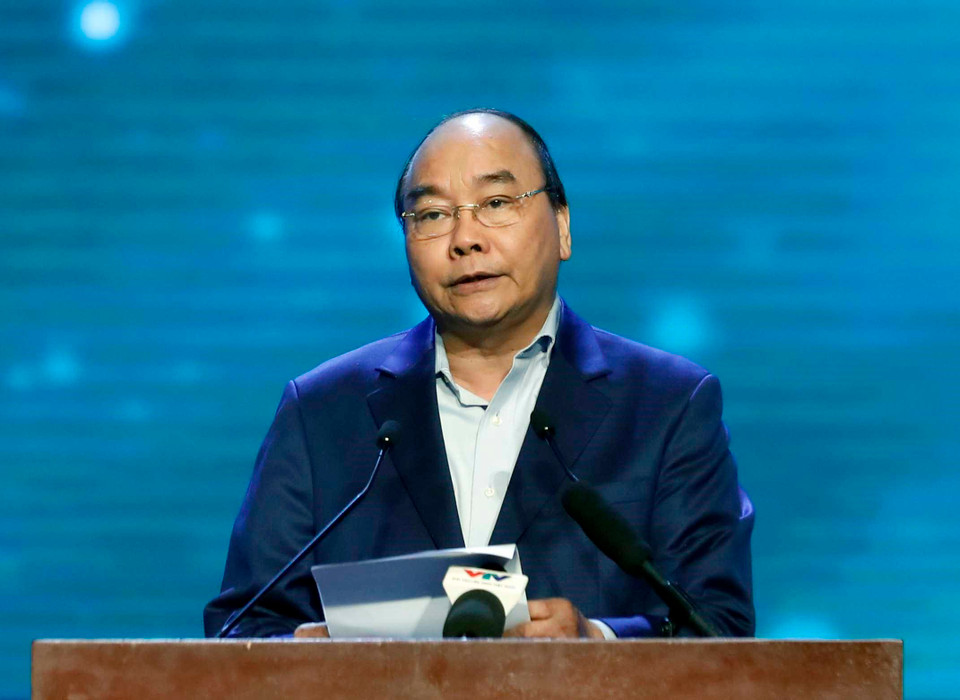 阮春福在活动上发表讲话。图自越通社