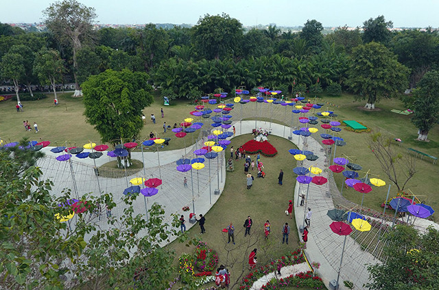 春季花街兴安省文江贸易与旅游都市区举办（图片来源：人民报）