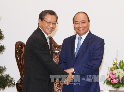 越南政府总理阮春福在政府总部会见了日本国际协力机构（ JICA ）国有企业及银行业结构调整咨询委员会主任武藤 • 敏郎 （图片来源: 越通社）