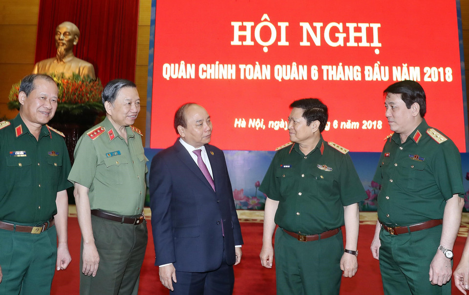 越南政府总理阮春福出席会议。越通社记者 统一 摄