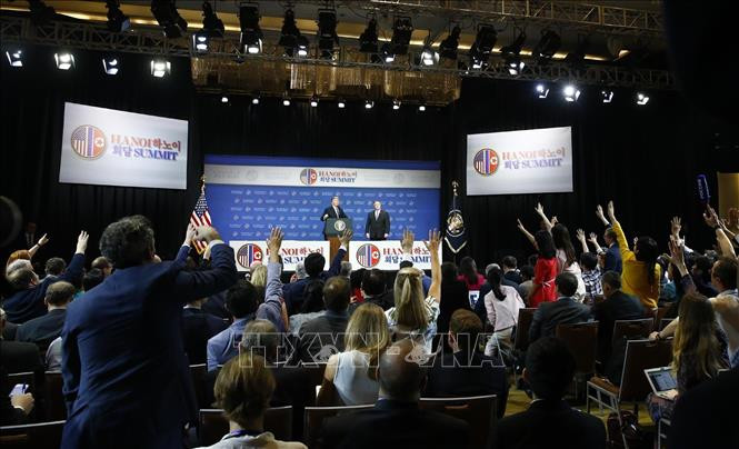 记者会场景。 图自越通社