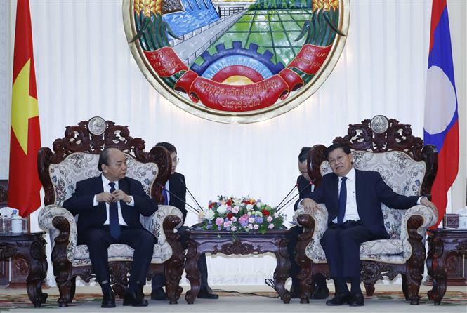 老挝承诺继续与越南密切配合，支持越南出色完成2020年东盟轮值主席国任期和2020-2021年任期联合国安理会非常任理事国。越通社记者 统一摄 