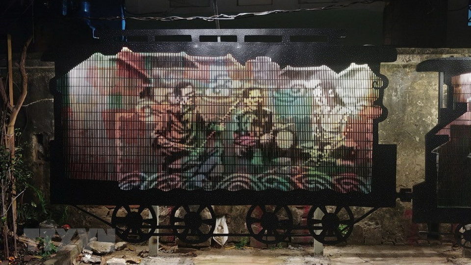 范刻光的作品《列车上的盲人曲班子》。图自越通社