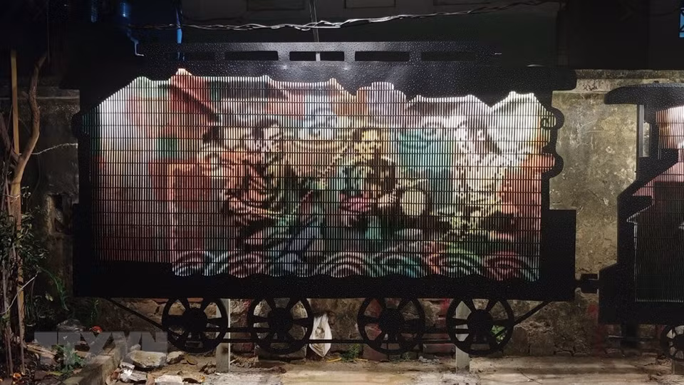 范刻光的作品《列车上的盲人曲班子》。图自越通社