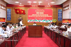 会议场景。图自越通社