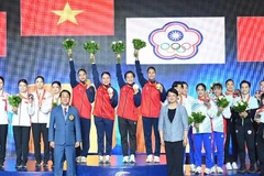 越南空手道队荣获在女子套路比赛金牌。图自互联网