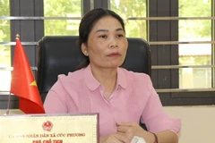 菊芳乡人民委员会副主席丁氏文。图自越通社