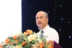 海外越南人国家委员会主任阮忠坚主持活动。图自越通社