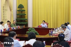 越南国家主席梁强主持《河内公约》开放签署仪式筹备工作部署会议。图自越通社