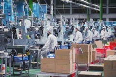 资料图:2025年,越南上半年国内生产总值(GDP)的增长率为7.52%,创下2011年以来同期的最高水平。图自越通社