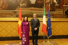 越南国家副主席武氏映春与意大利众议院议长洛伦佐·丰塔纳。图自越通社