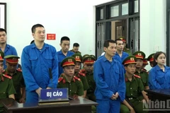 此案被告人在庭受审。图自《人民报》