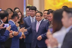 政府总理、越共中央政治局关于发展私营经济的第68-NQ/TW号决议国家指导委员会主任范明政。图自互联网