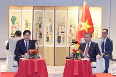 越共中央总书记苏林会见釜山市市长朴亨俊。图自越通社