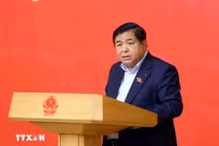 政府党委常委、政府副总理阮志勇在会议上发表讲话。图自越通社