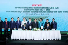 合同签字仪式。图自越通社