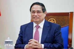 越南政府总理范明政。图自越通社