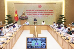 范明政主持召开2025年经济增长情景全国视频会议。图自越通社