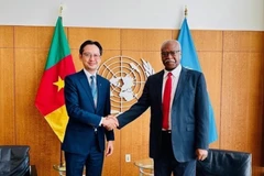 越南常驻联合国代表团团长杜雄越大使与第79届联合国大会主席菲勒蒙·杨。图自越通社