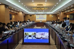 会议场景。图自越通社