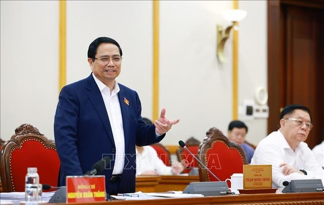 政府总理范明政在与山罗、清化、北宁、谅山等四省省委常务委员会代表进行工作座谈时发言。图自越通社 uuid9f2393ae-1cce-4810-9b19-25248248bbc9code001library1type1mode1loctruecaptrue.jpg